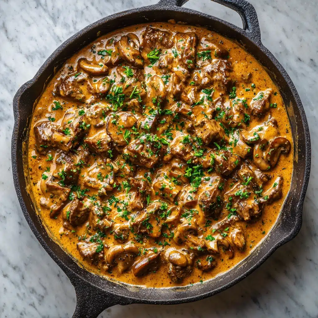 Top-down shot of creamy beef stroganoff in a skillet